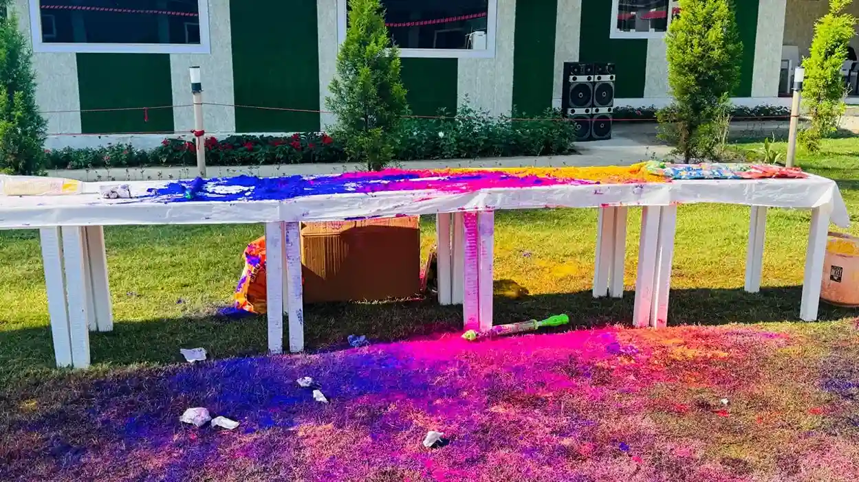 Holi festival color arrangement at an outdoor resort event in Rishikesh